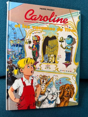 État satisfaisant livre rarissime Caroline et les vacances de Titus vintage album