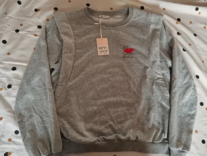 Sweat a message gris