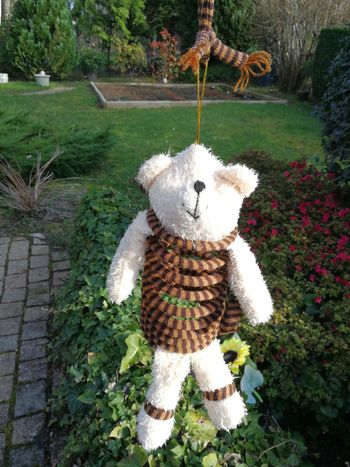 Peluche ours avec ressort