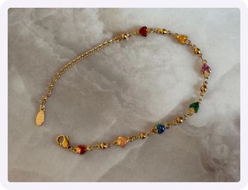 Bracelet doré à pierre multicolore