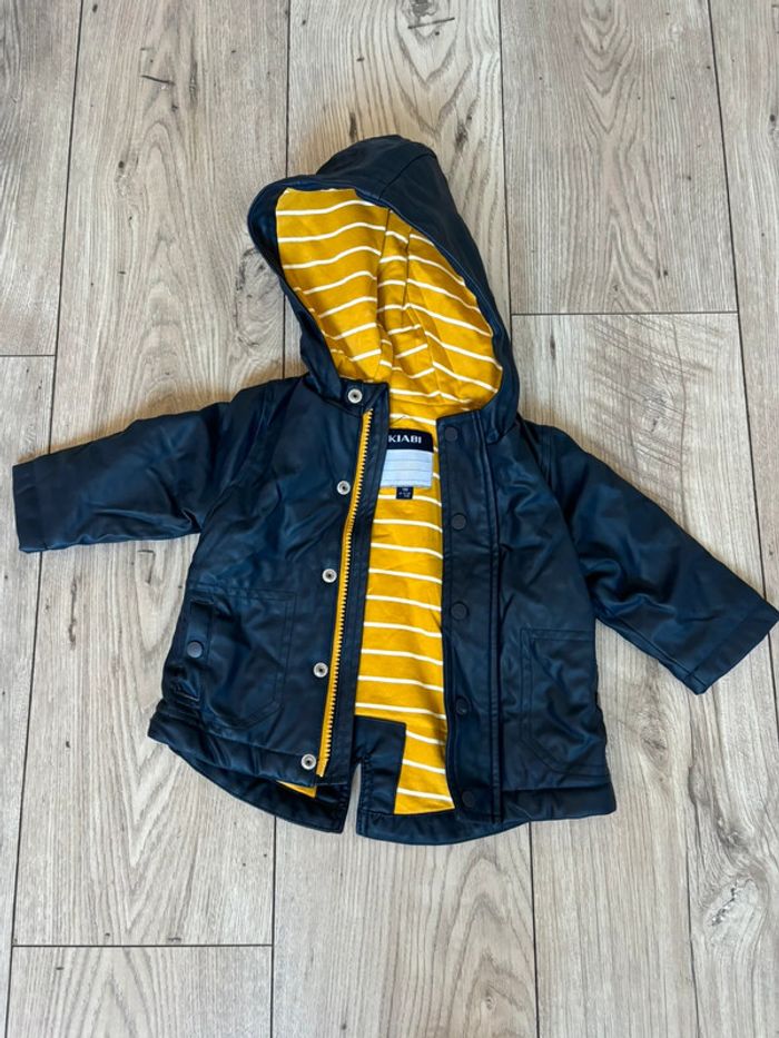 Manteau de pluie 9 mois