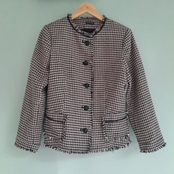 Veste élégante rose pâle et noire