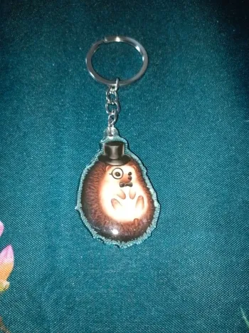 Porte clef majordome binocle hérisson association