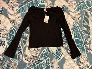 Neuf - Tee shirt noir à manches longues - Taille M/L