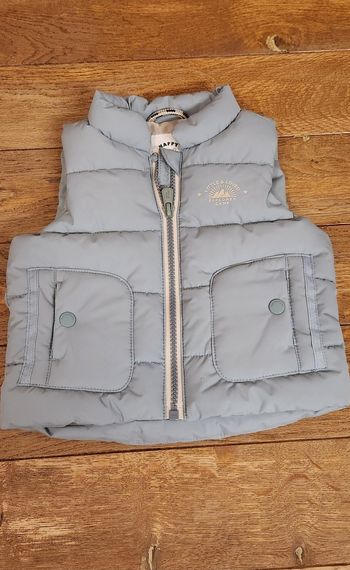 Veste sans manches bleue taille 68cm (6 mois)