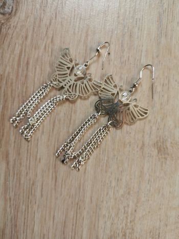 Boucles d'oreilles pendantes papillons et franges argentés