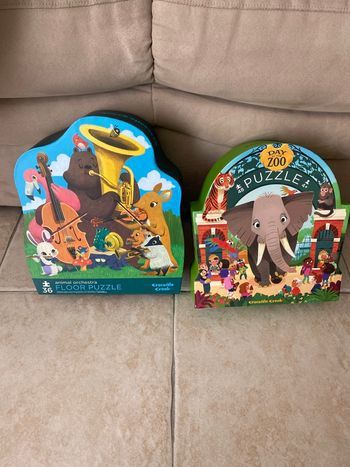 Lot de 2 puzzles crocodile creek 36 et 48 pieces 