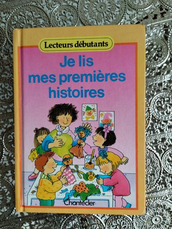 Livre " je lis mes premières histoires" 🧡