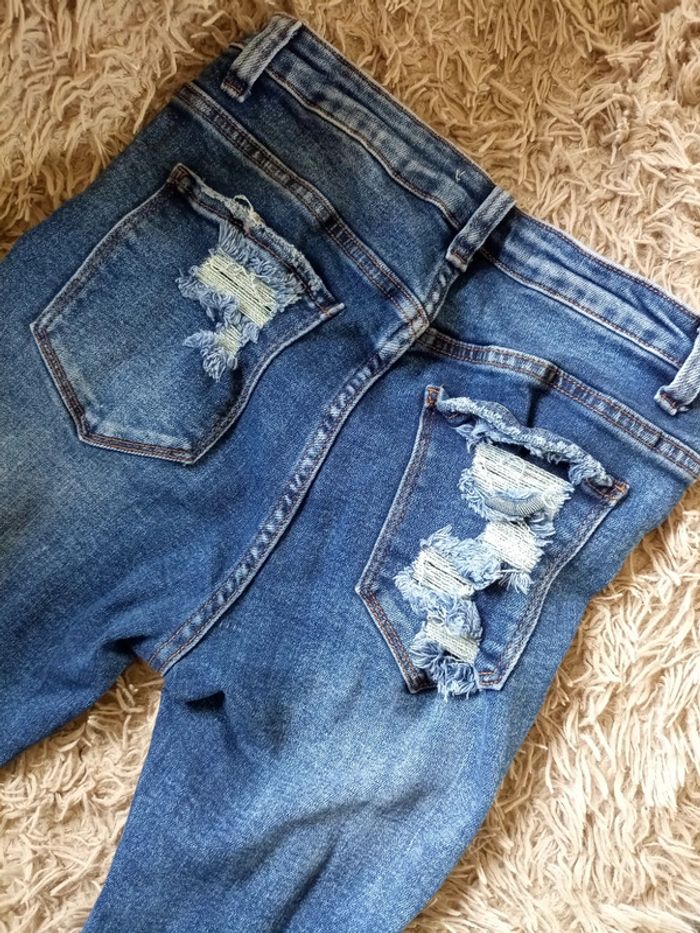 Jeans "troué" femme - photo numéro 7