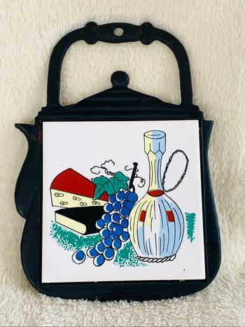 Dessous de tasse ou cafetière en fer noir