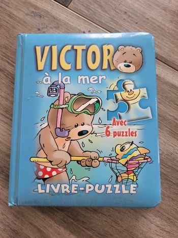 Livre puzzke Victor à la mer