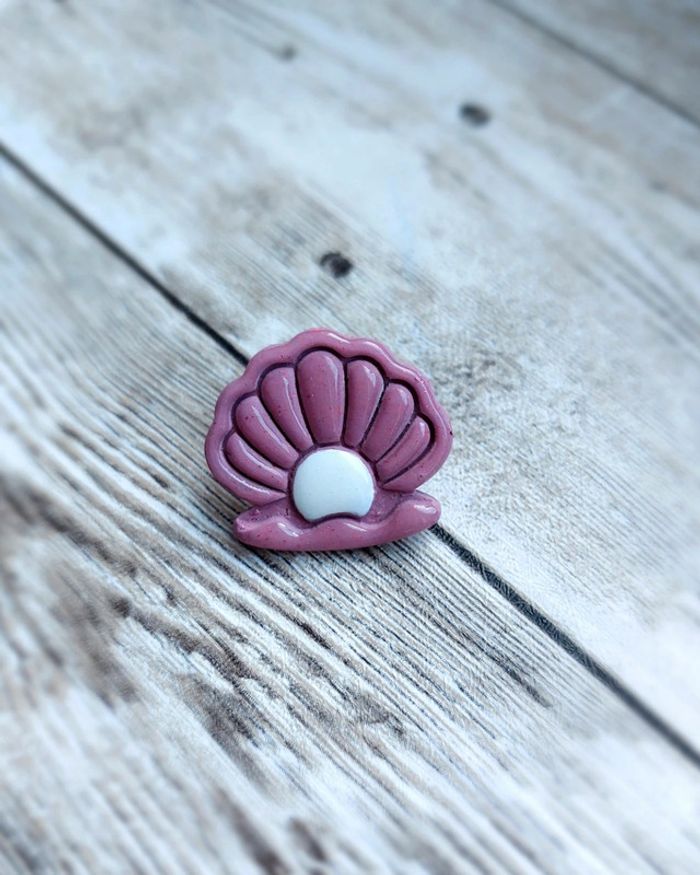 Pins coquillage
