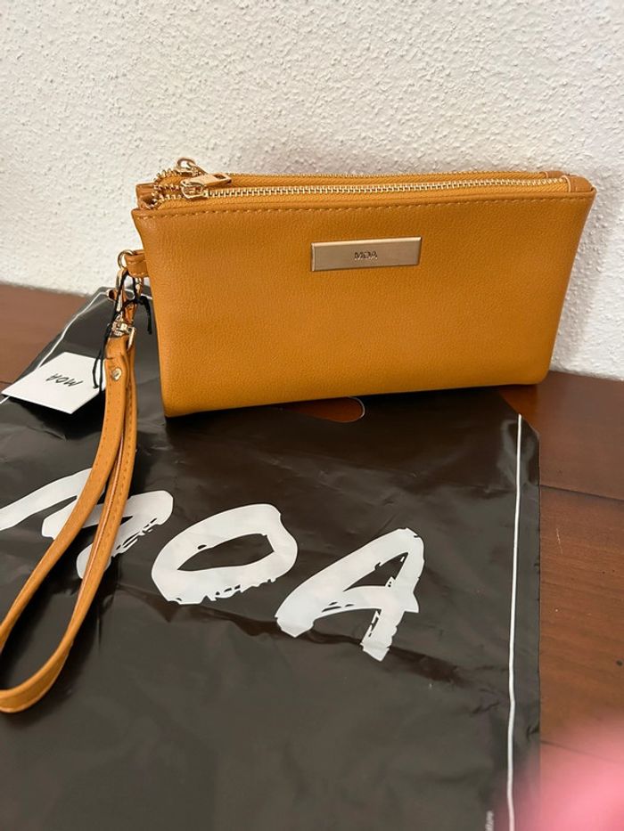 Porte feuille avec anse