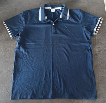 Polo manches courtes bleu marine
Taille : L