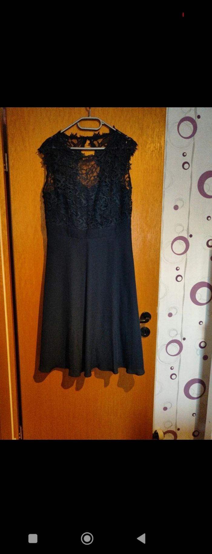 Belle robe dentelée neuve