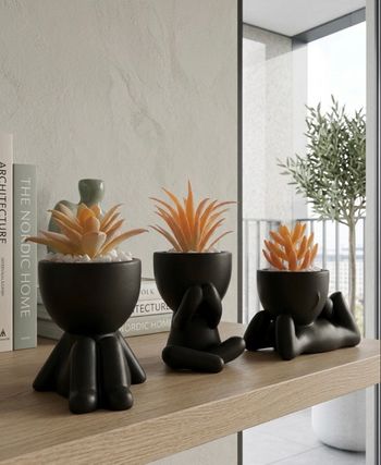 Pots de fleurs en forme de personnage 