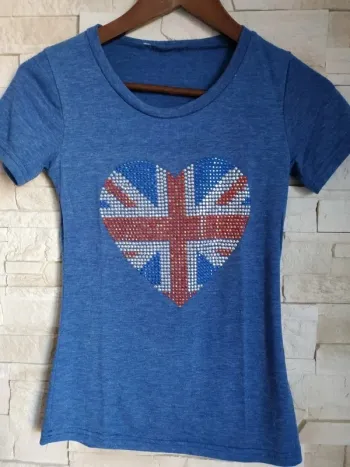 T-shirt fille bleu moucheté 14 ans tbe marque coupée