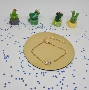 Bracelet fantaisie doré avec breloque