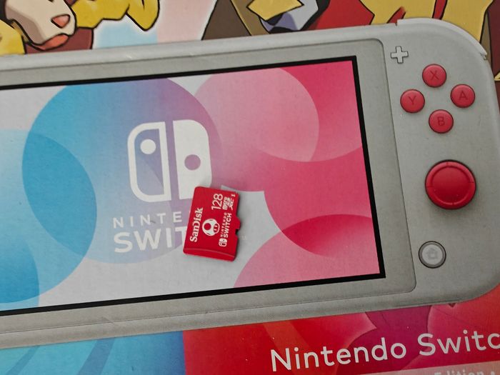 Nintendo Switch lite édition limitée pokemon + jeu pokémon épée - photo numéro 4