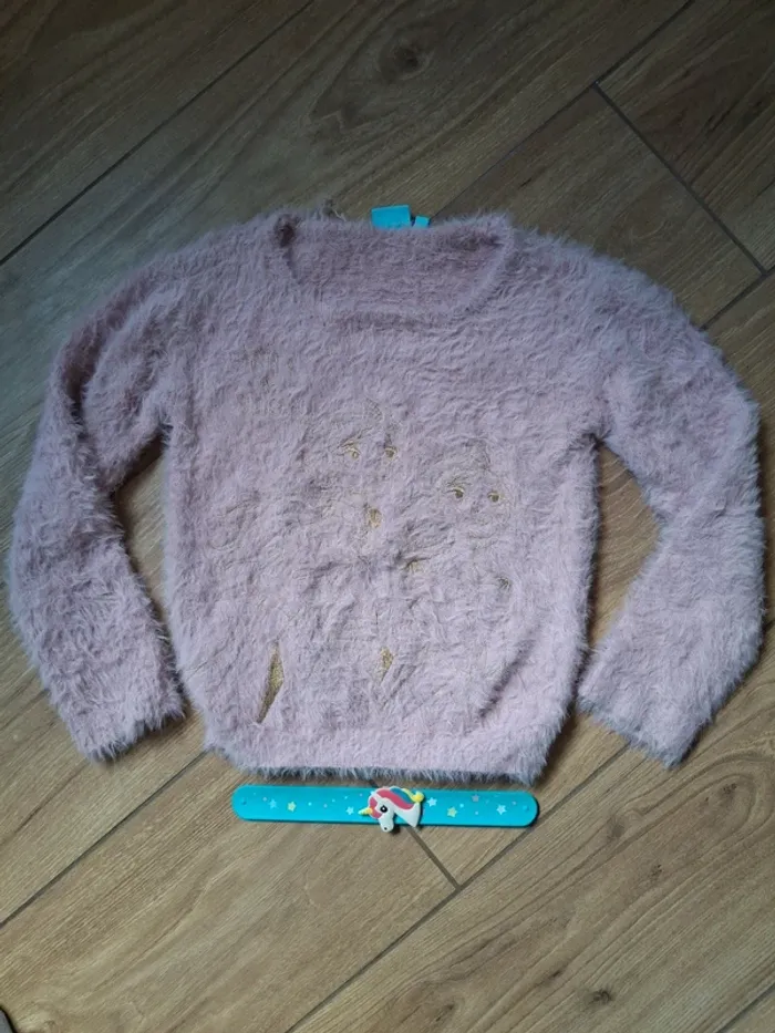 Pull très chaud reine des neiges 6 ans très bon état