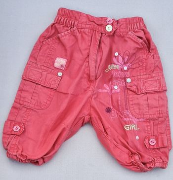 Pantalon rose Kiss melody 6 mois en bon état