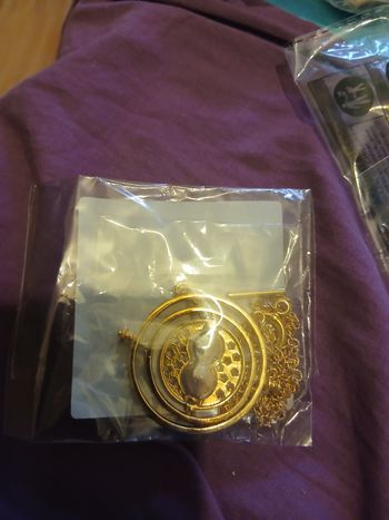 Collier retourner de temps harry potter neuf doré
