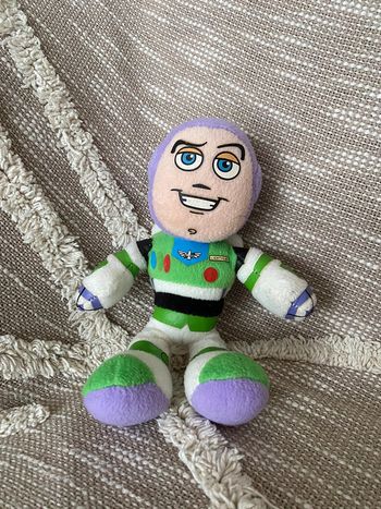 Peluche doudou 21cm Disney Toy story buzz l’eclair astronaute violet blanc vert très bon état