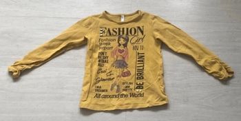 TEE shirt manche longue 4 ans petit défaut