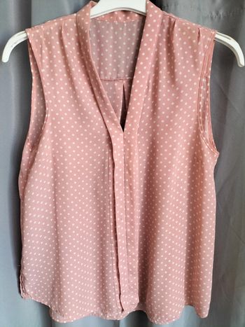 Blouse rose à pois blancs taille 44