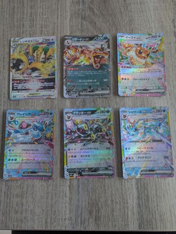 Lot Pokémon Jap Évoli + évolutions + Dracaufeu – 6 cartes brillantes – NM sortie de booster