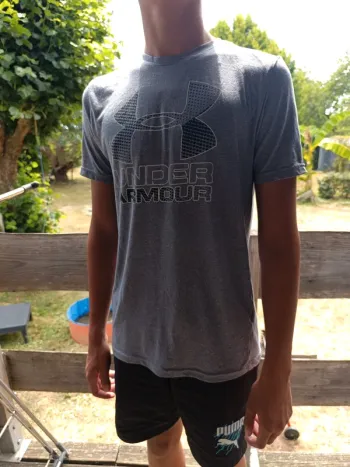 T-shirts under armour heat Gear gris taille M