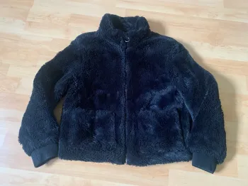 Manteau fausse fourrure