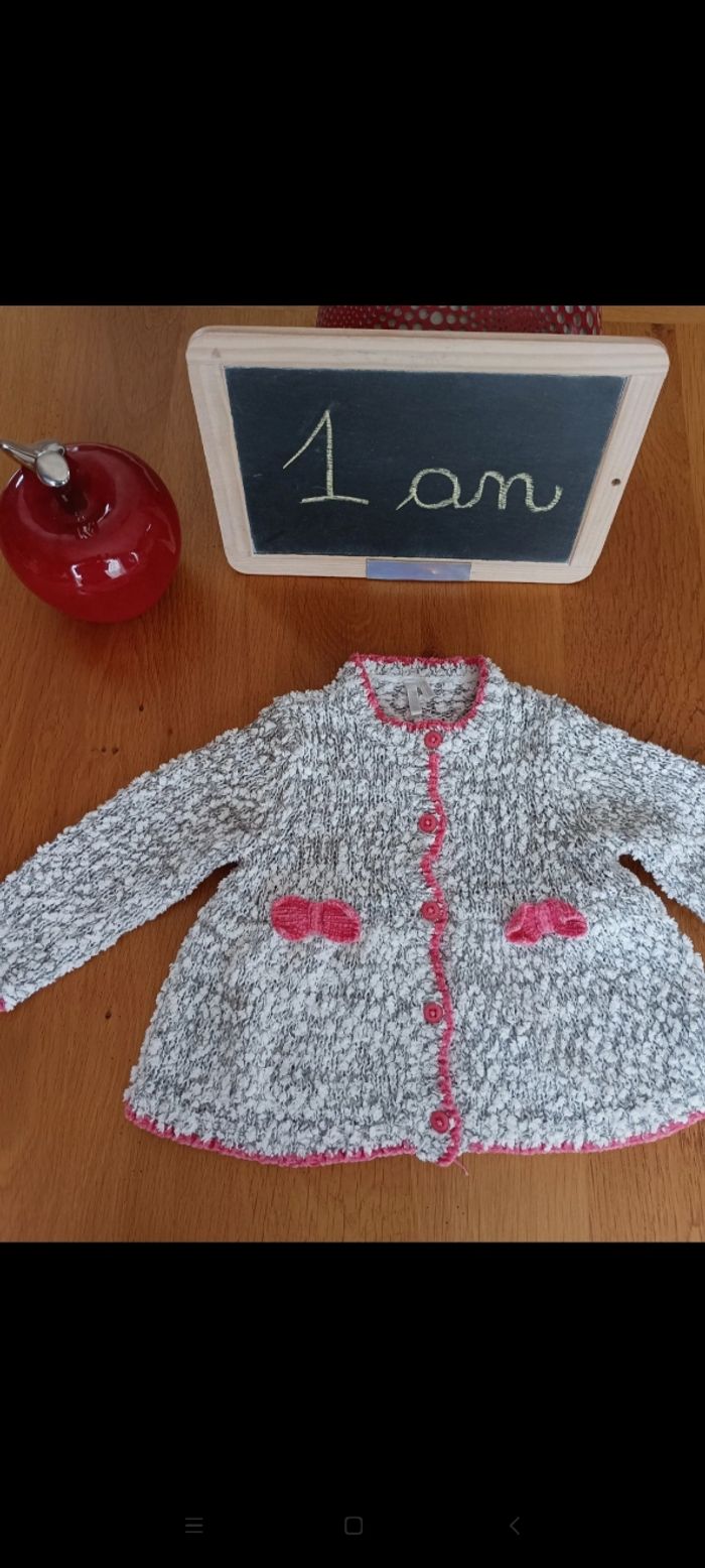 Gilet Orchestra taille 1 an en très bon état