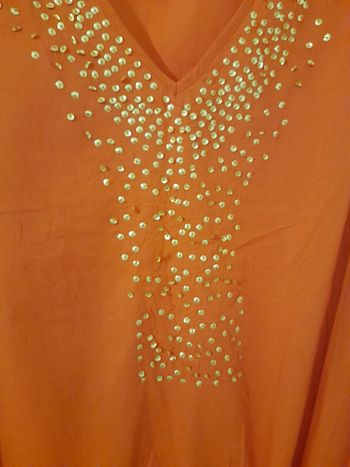 Tuniques avec paillettes dorées