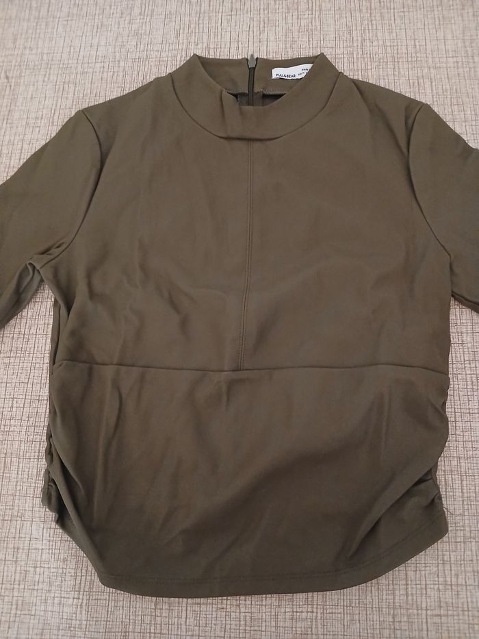 Haut simili cuir taille M pull & bear