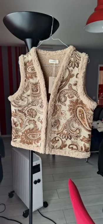Gilet sans manche neuf