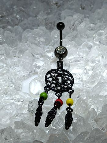 piercing attrape reve nombril noir perle rouge jaune vert