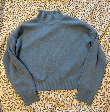 Pull col roulé