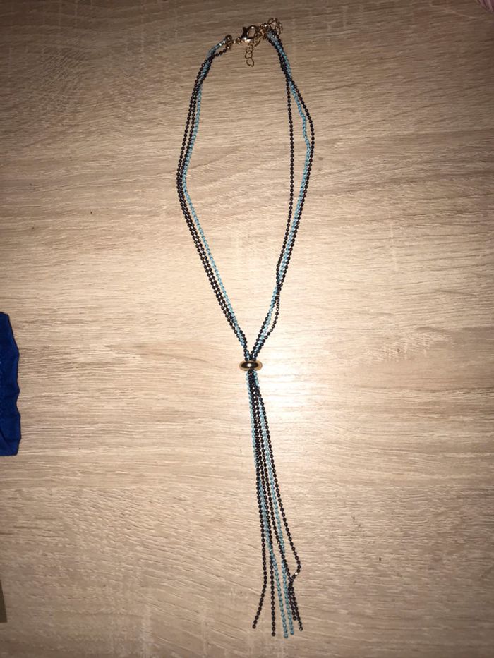 Pendentif neuf sous emballage