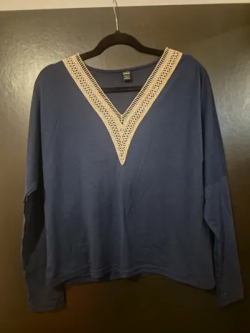 Pull col brodé