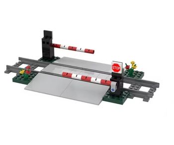 Passage à niveau fleuri avec panneau STOP