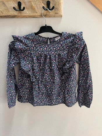 Jolie blouse marine fleurie 10 ans tape à l’œil