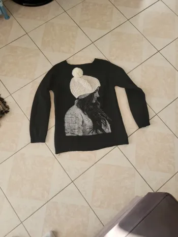 Joli pull taille M