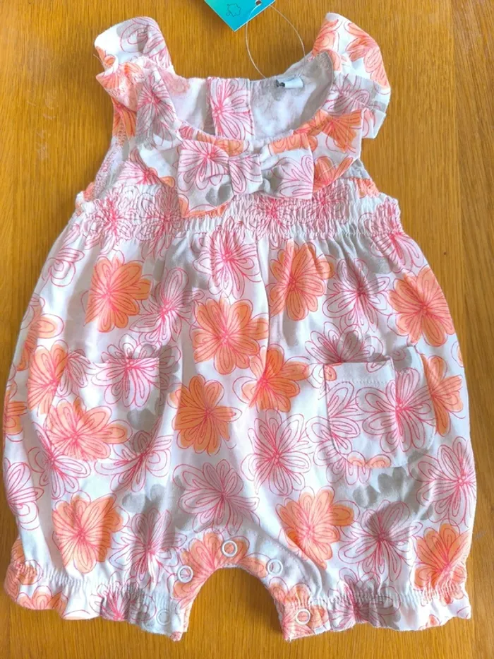 318319 barboteuse blanc/orange fille 3 mois