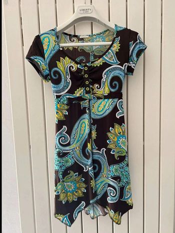 Tunique manches  courtes, FormuL  taille  36 en parfait état