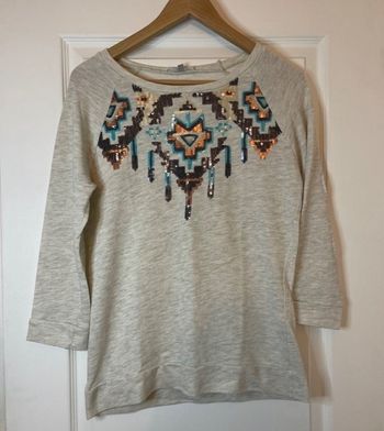 Pull beige strass