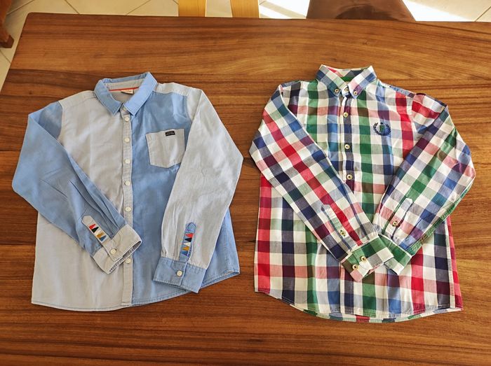 Lot de 5 vêtements garçon taille 10 ans 
1 chemise tape à l'oeil très bon état 
1 chemise El flamenco très bon état 
1 gilet Okaïdi très bon état 
1 veste sans manches Okaïdi neuf 
1 sweat Kiabi neuf - photo numéro 2