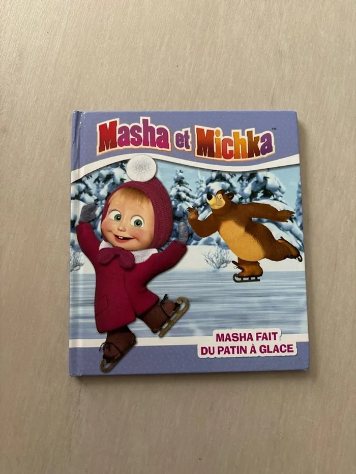 Masha et Michka. Masha fait du patin à glace