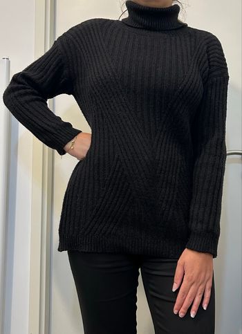 Pull noir col roulé 