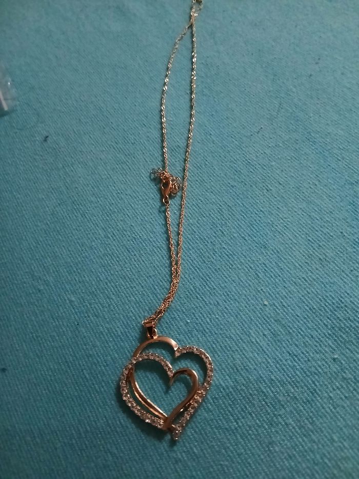 Collier doree 2 cœurs neuf